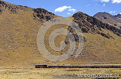 Peru,Cusco. Train passing through the mountainous area of â€‹â€‹Cusco Editorial Stock Photo